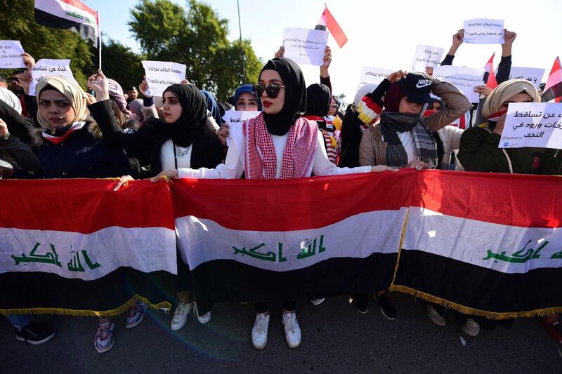 Iraqi university students take part in a protest in central Baghdad, Iraq.  EPA