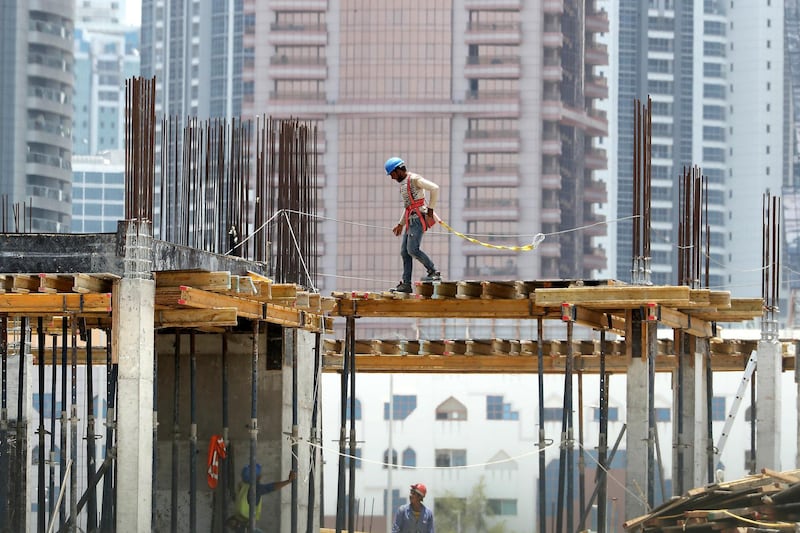 DUBAI, UNITED ARAB EMIRATES , June 11 – 2020 :- Workers at one of the construction site in Al Satwa area in Dubai.  The UAE’s compulsory midday break for outdoor workers will start from June 15. (Pawan Singh / The National) For News/Standalone/Online/Stock