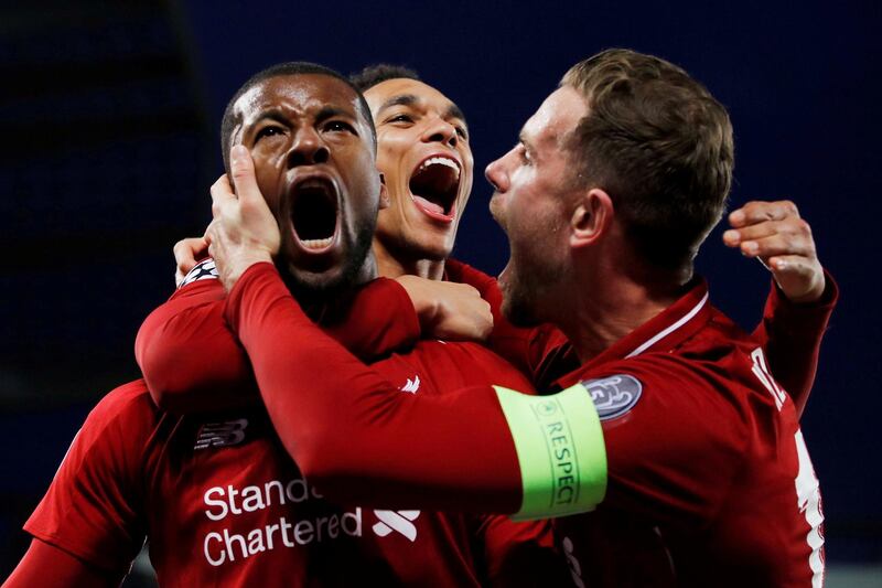 FILE PHOTO: Soccer Football - Champions League Semi Final Second Leg - Liverpool v FC Barcelona - Anfield, Liverpool, Britain - May 7, 2019  Liverpool's Georginio Wijnaldum celebrates scoring their third goal with Jordan Henderson and Trent Alexander-Arnold   REUTERS/Phil Noble/File Photo