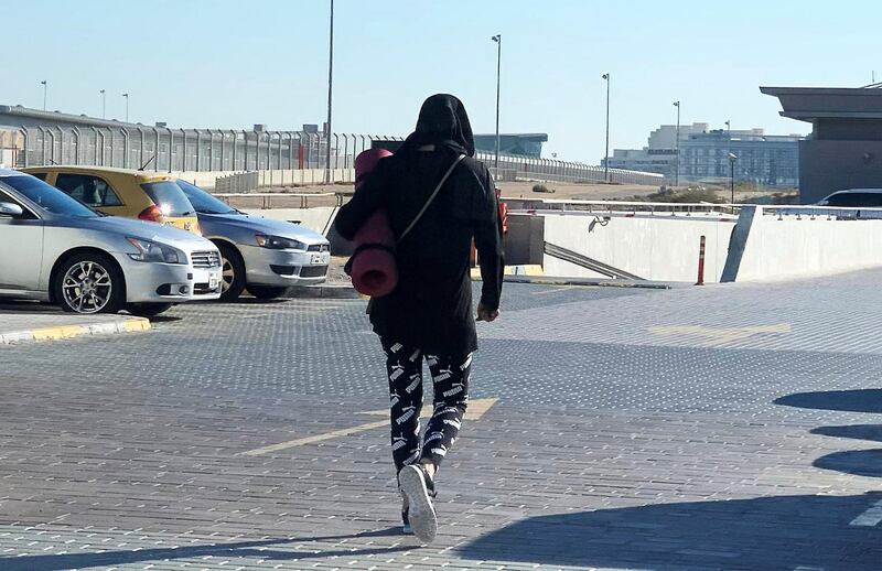 DUBAI, UNITED ARAB EMIRATES , January 5 – 2021 :- People wearing warm clothes during the winter season in Motor City area in Dubai. (Pawan Singh / The National) For News/Stock/Online.