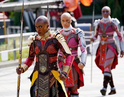 Characters from the film "Black Panther" perform during "The Warriors of Wakanda: The Disciplines of the Dora Milaje" show at the Avengers Campus media preview at Disney's California Adventure Park on Wednesday, June 2, 2021, in Anaheim, Calif. (AP Photo/Chris Pizzello)