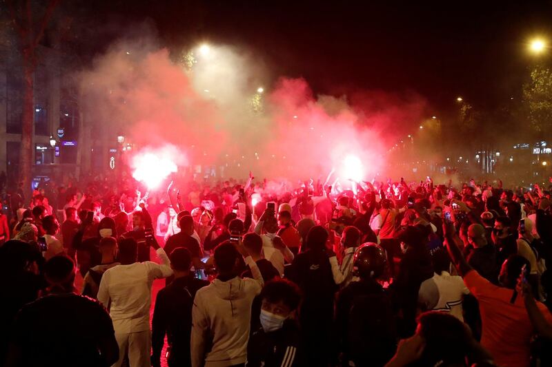 PSG fans on the Champs-Elysees after the match. Reuters
