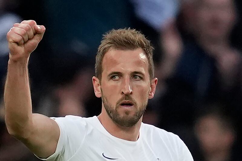 Tottenham's Harry Kane celebrates after scoring the first goal from the penalty spot in the 3-0 win against Arsenal at Tottenham Hotspur Stadium on May 12, 2022. AP