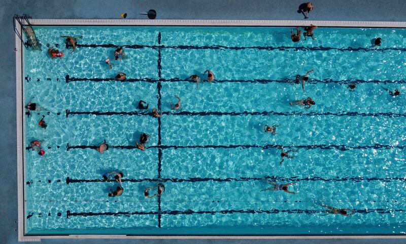 An aerial view shows swimmers at Hathersage Swimming Pool, west of Sheffield in northern England. AFP