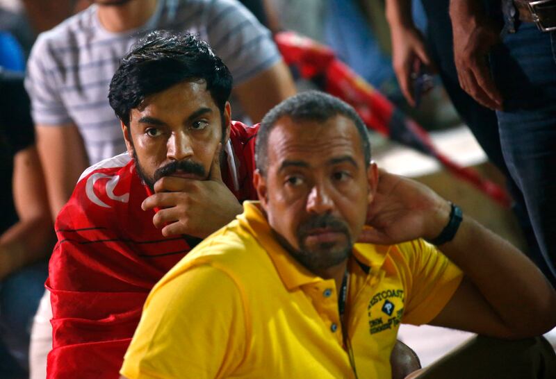 Fans of Egyptian team Al Ahly look dejected after the match. Reuters