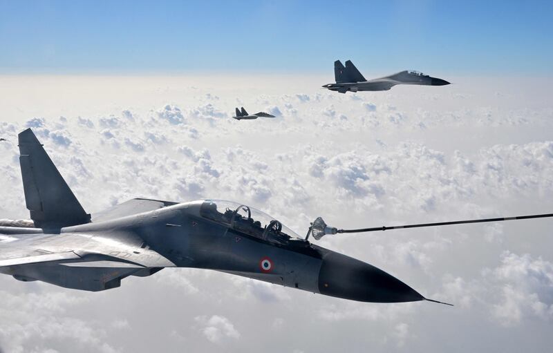 Indian fighter jets take part in an air refuelling exercise during a joint military exercise with France in Rajasthan. AFP