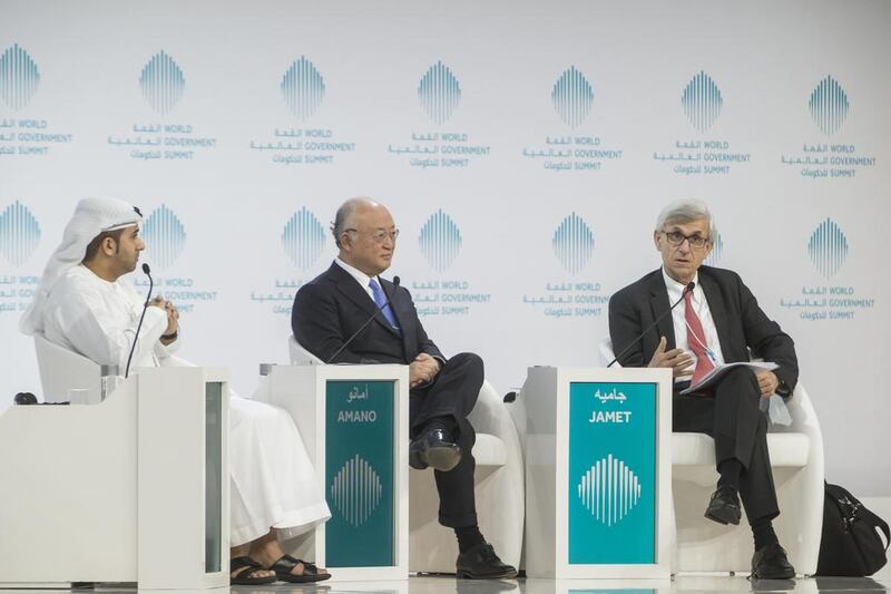 From left: Hamad Al Kaabi, Permanent Representative of the UAE to the IAEA, Yukiya Amano, director general of the International Atomic Energy Agency, and panelist Philippe Jamet speak at the World Government Summit.  Antonie Robertson / The National