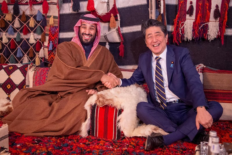 Saudi Arabia's Crown Prince Mohammed bin Salman shakes hands with Japan's Prime Minister Shinzo Abe during a meeting in Riyadh. All photos are courtesy of Saudi Royal Court via Reuters