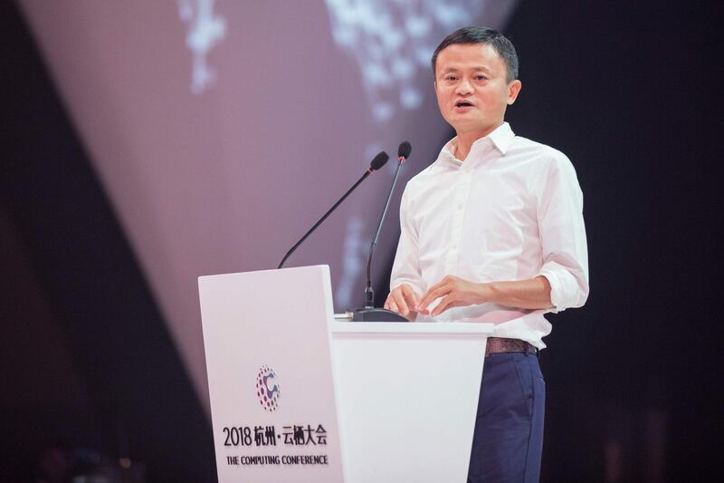 This photo taken on September 19, 2018 shows Alibaba founder Jack Ma delivering a speech during the 2018 Computing Conference in Hangzhou in China's eastern Zhejiang province. Ma said his ambitious pledge to create one million jobs in the US had been scuppered by the trade row between Beijing and Washington, Chinese state news reported on September 19. - China OUT
 / AFP / STR
