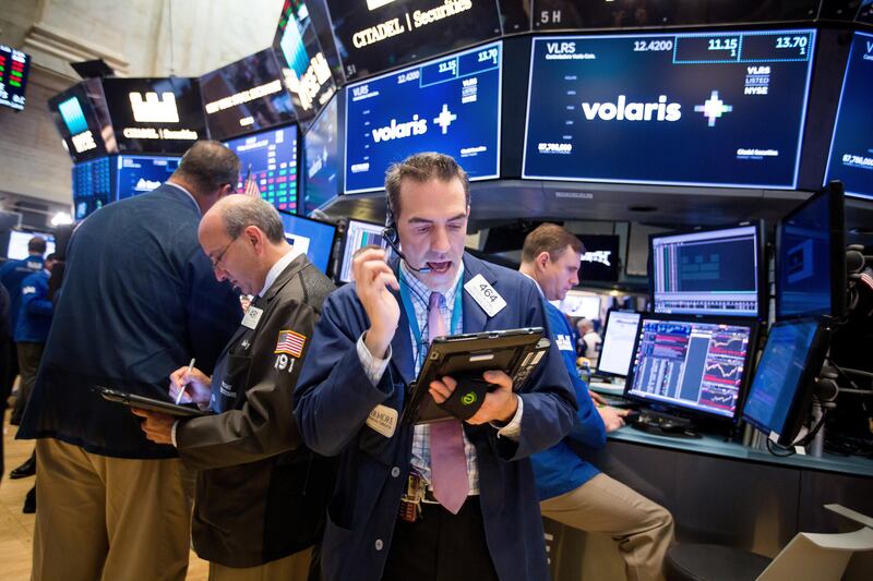 Traders work on the floor of the New York Stock Exchange (NYSE) in New York, U.S., on Friday, Sept. 15, 2017. Rediscovering their love for U.S. stock funds, investors added the most money since June��during the past week,��as the Trump administration plotted strategy for pushing a tax overhaul and the S&P 500 rose to a record. Photographer: Michael Nagle/Bloomberg