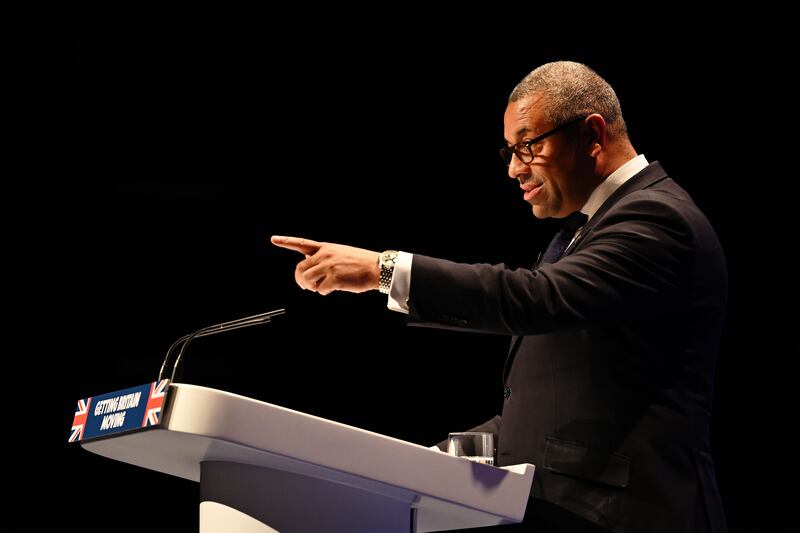 Mr Cleverly addresses the 2022 Conservative Party Conference in Birmingham. Getty Images