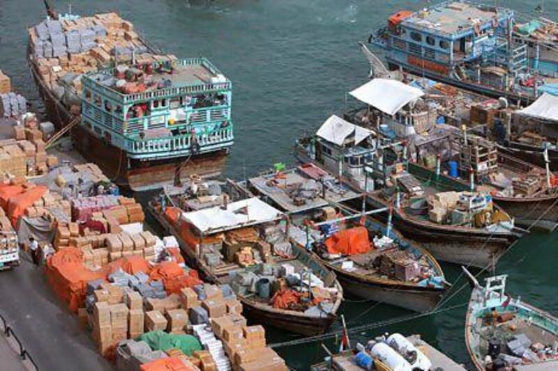 Dhows that ply the waters between Iran and the Emirates are seen docked in Dubai. Historic commercial ties between the nations have been strained as the screw of western sanctions against Tehran has tightened. Pawan Singh / The National