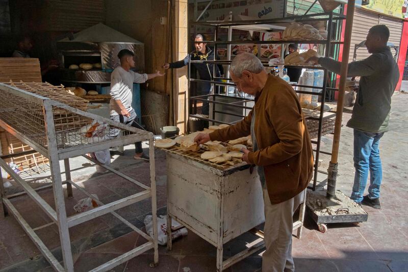 A bakery at a market in Cairo. Soaring bread prices sparked by Russia's war in Ukraine have bitten into the purchasing power of Egyptian consumers. AFP