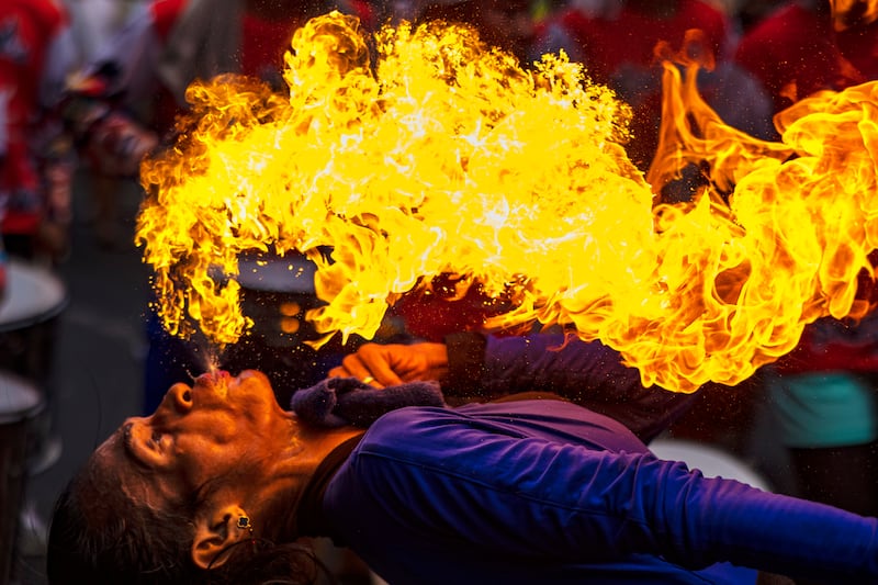 A performer breathes fire during Chinese New Year celebrations at Binondo district, considered the world's oldest Chinatown, in Manila. Getty Images