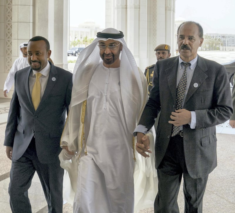 ABU DHABI, UNITED ARAB EMIRATES - July 24, 2018: HH Sheikh Mohamed bin Zayed Al Nahyan Crown Prince of Abu Dhabi Deputy Supreme Commander of the UAE Armed Forces (C), receives HE Dr Abiy Ahmed, Prime Minister of Ethiopia (L) and HE Isaias Afwerki, President of Eritrea (R), at the Presidential Palace. 

( Hamad Al Kaabi / Crown Prince Court - Abu Dhabi )
---