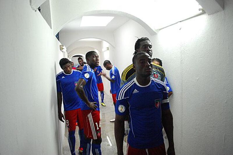 Players await the start of the match in the tunnel.