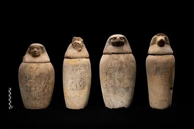 A set of canopic jars found at the bottom of a burial shaft in the Abusir necropolis. Photo: Ministry of Tourism & Antiquities