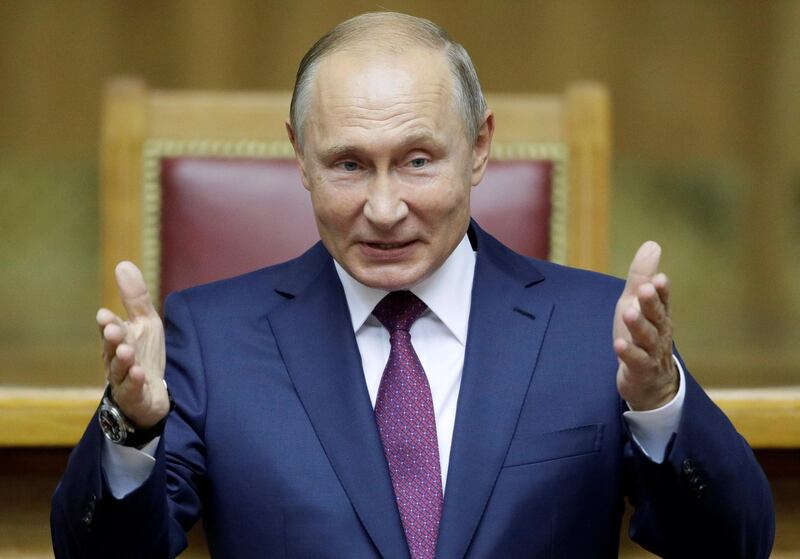 Russian President Vladimir Putin attends a session of the Eurasian Women's Forum in St. Petersburg, Russia September 20, 2018. Dmitri Lovetsky/Pool via REUTERS