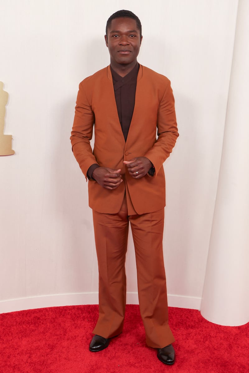 David Oyelowo in a suit the colour of burnt ochre. AFP