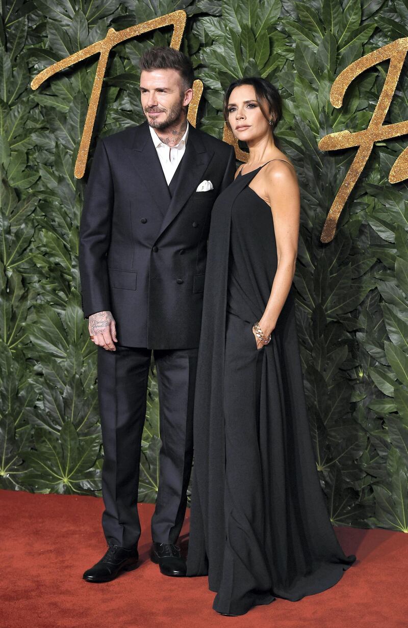 LONDON, ENGLAND - DECEMBER 10: David Beckham and Victoria Beckham arrive at The Fashion Awards 2018 In Partnership With Swarovski at Royal Albert Hall on December 10, 2018 in London, England.  (Photo by Jeff Spicer/BFC/Getty Images for BFC)