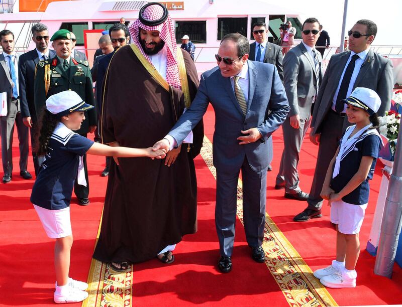 Egyptian President Abdel Fattah al-Sisi (R) and Saudi Crown Prince Mohammad Bin Salman visit the Suez Canal at the city of Ismailia, Egypt, March 5, 2018, in this handout picture courtesy of the Egyptian Presidency. The Egyptian Presidency/Handout via REUTERS ATTENTION EDITORS - THIS IMAGE WAS PROVIDED BY A THIRD PARTY