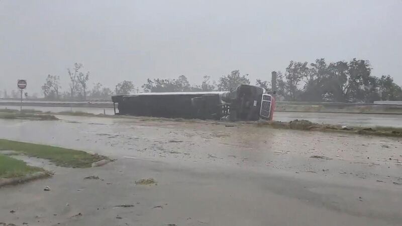 A truck flipped on its side due to winds from Hurricane Delta is seen at Lake Charles, Louisiana. Reuters