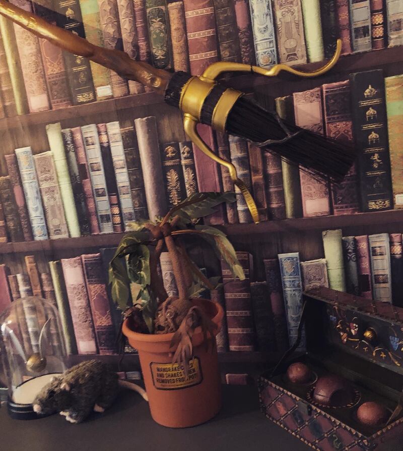 Accio Firebolt: the room is replete with themed wallpapers, including ones that resemble Hogwarts library, the Daily Prophet newspaper and the Marauder's Map.