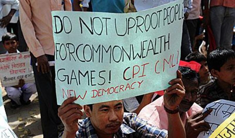 Protesters in New Delhi demonstrate against price increases of basic commodities created by the cost of the Commonwealth Games.