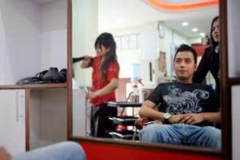 Pop singer Nima Rumba regularly visits Beauty Clubs, a salon in Kathmandu that specializes in the "Korean look." (Annette Ekin for The National) *** Local Caption ***  NIMA RUMBA.jpg