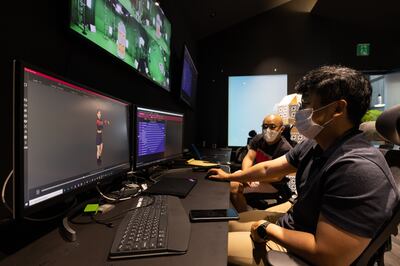 Employees create a 3D avatar in the Jump Studio at the SK Telecom headquarters in Seoul. Bloomberg 