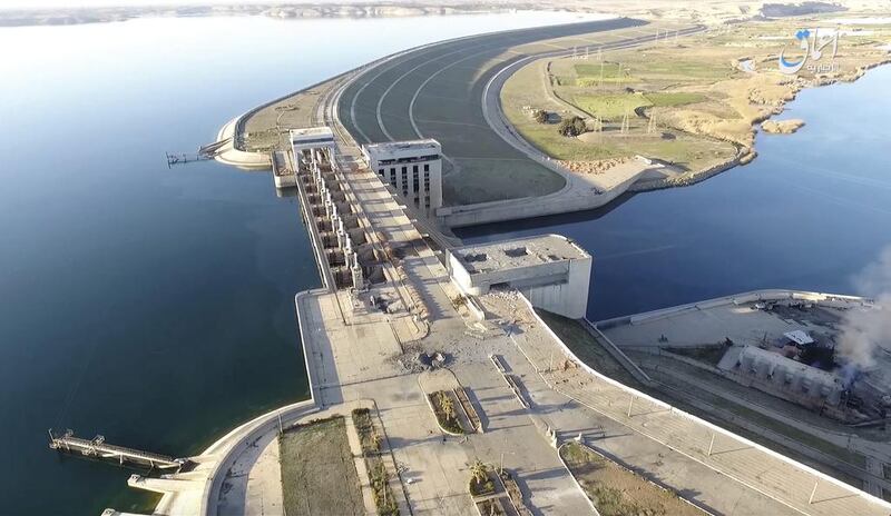 The Tabqa Dam in Syria’s Raqqa province, as seen in footage taken by a drone and posted online on March, 27, 2017 by ISIL’s Amaq propaganda agency. Amaq via AP