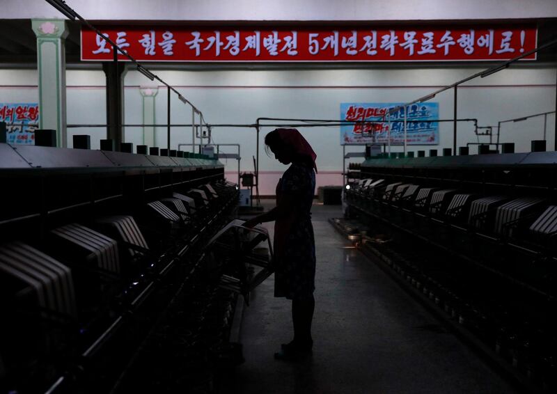 epa07134709 (FILE) - A North Korean woman works at a silk factory in Pyongyang, North Korea, 07 September 2018 (reissued 01 November 2018). According to a report by Human Rights Watch on 01 November, women in North Korea are subjected to widespread sexual abuse by officials. The report is based on interviews conducted with refugees from the reclusive country, detailing accounts of reape and sexual abuse that have become 'normal' and an accepted part of life to oridnary women.  EPA/HOW HWEE YOUNG