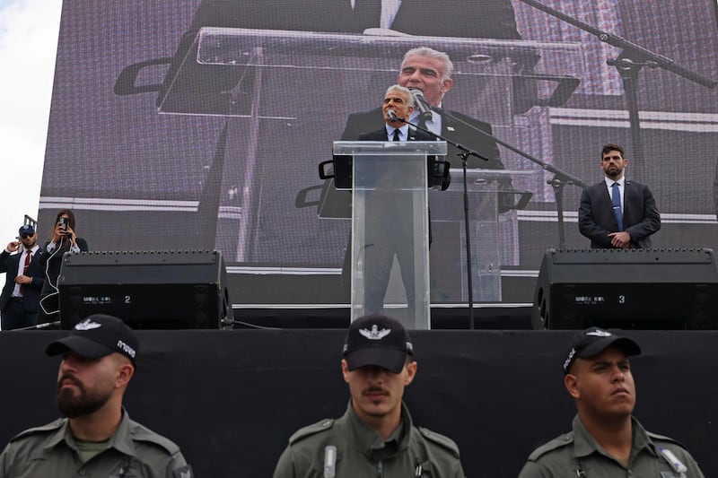 Opposition leader and former prime minister Yair Lapid speaks outside the parliament in Jerusalem. AFP