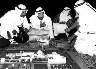 Sheikh Zayed bin Sultan Al Nahyan reviewing the Islamic city "Emirates University" with Sheikh Hamdan bin Mohammed bin Khalifa Al Nahyan (1974).