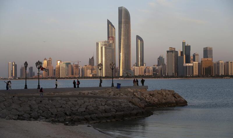 The decline in oil prices wiped more than 20 per cent off the value of Abu Dhabi and Dubai equities from the beginning of October to the middle of December. Kamran Jebreili / AP Photo