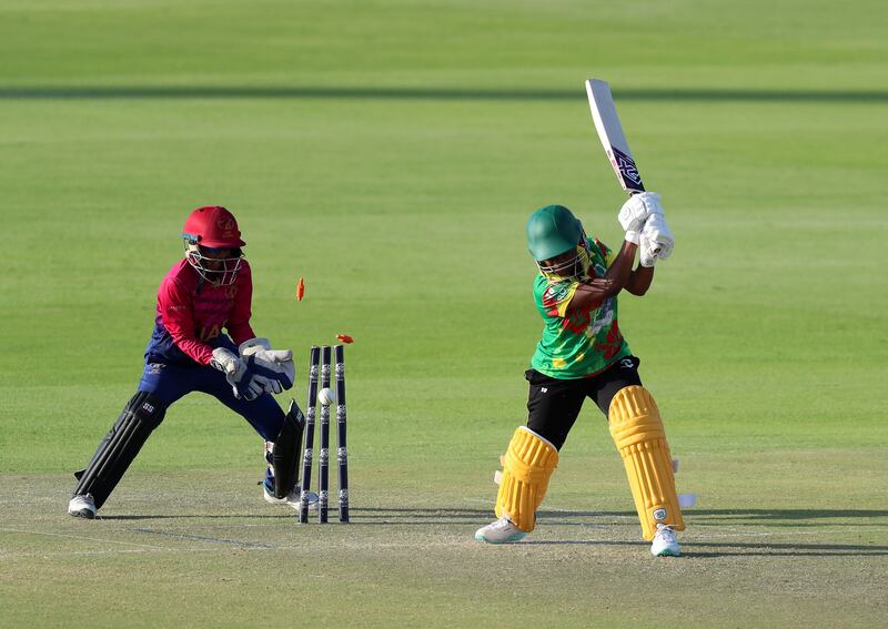 Vanuatu' batter Rayline Ova is bowled by UAE's Heena Hotchandani for six. Vanuatu finished their innings on 63-8