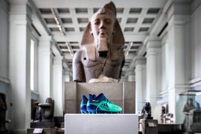 Mohamed Salah's boots sit on display in the British Museum in London.