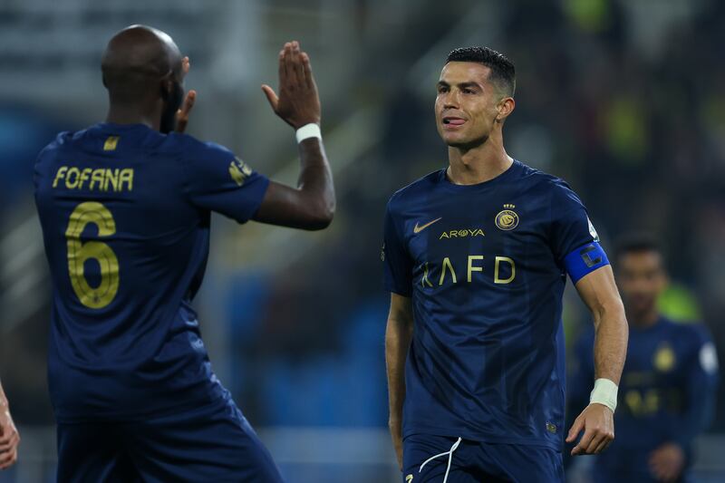 Cristiano Ronaldo celebrates with teammate Seko Fofana, who supplied the cross for his goal. Getty Images