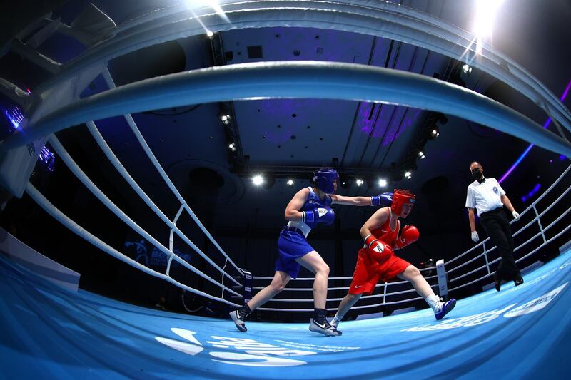Sumaiya Qosimova of Tajikistan (in red) in action against Lutsaikhan Altantsetseg of Mongolia in the women's flyweight preliminary bout at the Asian Boxing Championships in Dubai on May 25. Getty