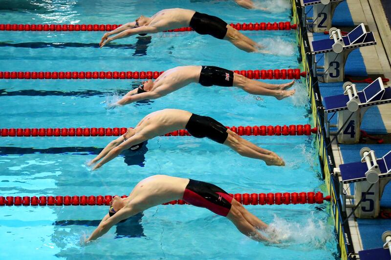 Competitors in the men's 200m backstroke final during the Manchester International Swimming Meet in England on Friday, February 12. Getty