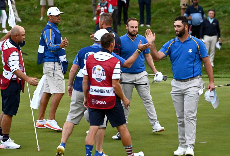 Team Europe's Jon Rahm (right) celebrates on the eighteenth green after the Afternoon Four-Ball session on day one of the 43rd Ryder Cup at Whistling Straits, Wisconsin on Friday September 24, 2021. Getty