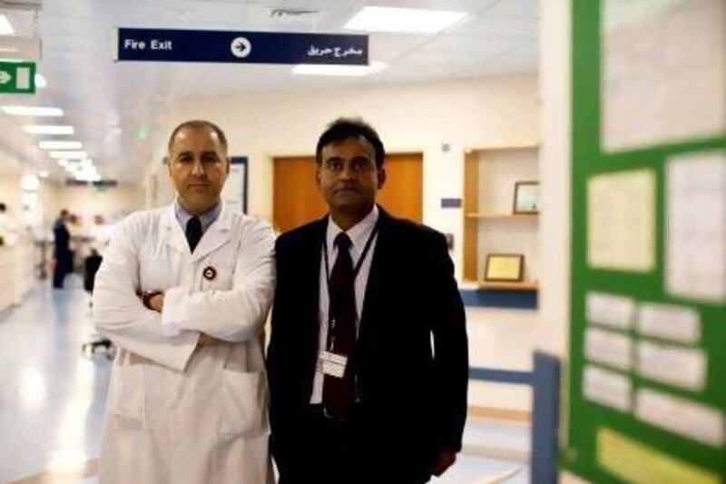 Dr Ammar Abdulbaki, left, and Surgical Director of Transplantation, Dr Muhammad Badar Zaman, at Sheikh Khalifa Medical City.