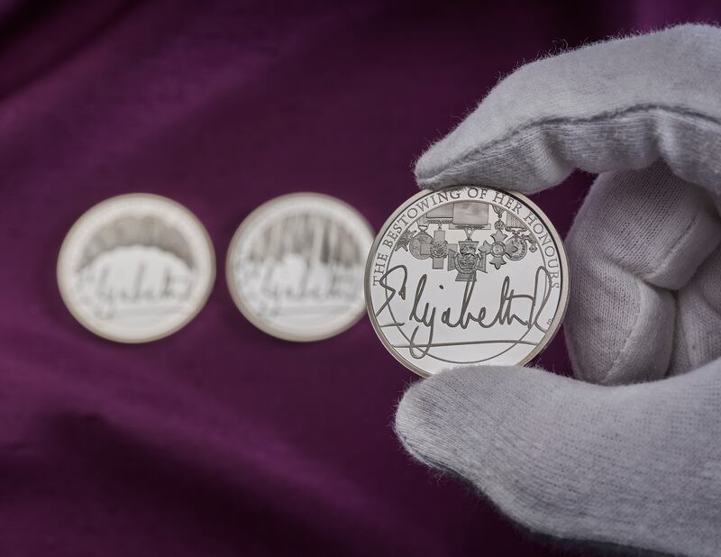 The royal signature is shown off on the new coins. Photo: Royal Mint
