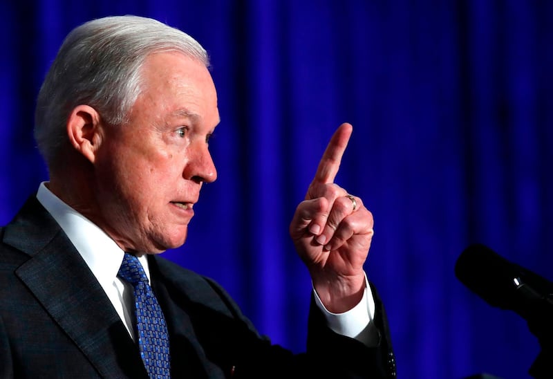 FILE - In this June 21, 2017, file photo, Attorney General Jeff Sessions introduces Vice President Mike Pence at the Justice Department's National Summit on Crime Reduction and Public Safety, in Bethesda, Md. Attorney General Sessions has ordered a "zero tolerance" policy aimed at people entering the United States illegally for the first time on the Mexican border. His directive Friday, April 6, 2018, tells federal prosecutors in border states to put more emphasis on charging people with illegal entry, which has historically been treated as a misdemeanor offense for those with few or no previous encounters with border authorities. (AP Photo/Jacquelyn Martin, File)