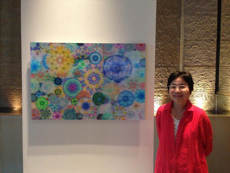 Moha Ahn Yuen with a work from her Kaleidoscope series