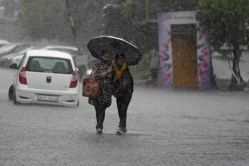 A flooded street during a downpour in Jammu, India.  India's monsoon season runs from June to September.  AP Photo 