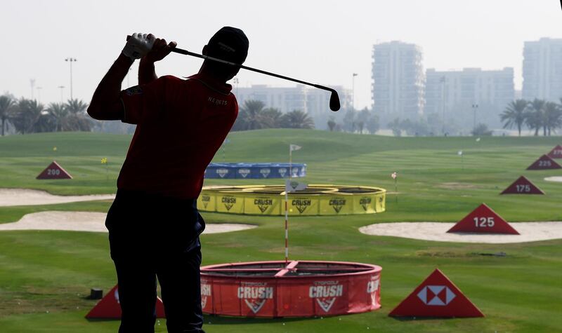 Matt Kuchar takes part in Top Golf Crush ahead of the Abu Dhabi HSBC Championship. Ross Kinnaird / Getty Images