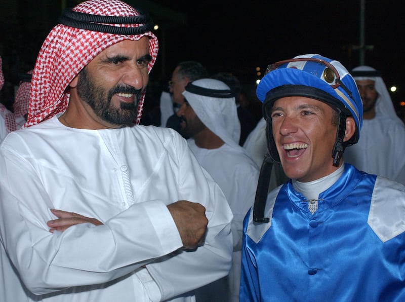 Sheikh Mohammed bin Rashid with jockey Frankie Dettori who rode Moon Ballad to success in the 2003 Dubai World Cup at Nad Al Sheba racecourse. Reuters