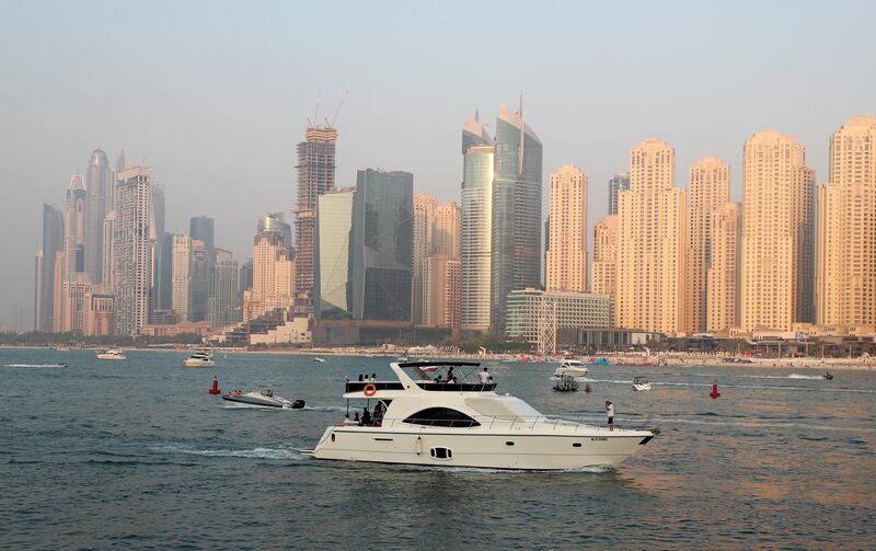 Dubai, United Arab Emirates - September 21, 2019: Standalone. A yacht in the marina on a humid day in Dubai. Saturday the 21st of September 2019. Bluewaters, Dubai. Chris Whiteoak / The National