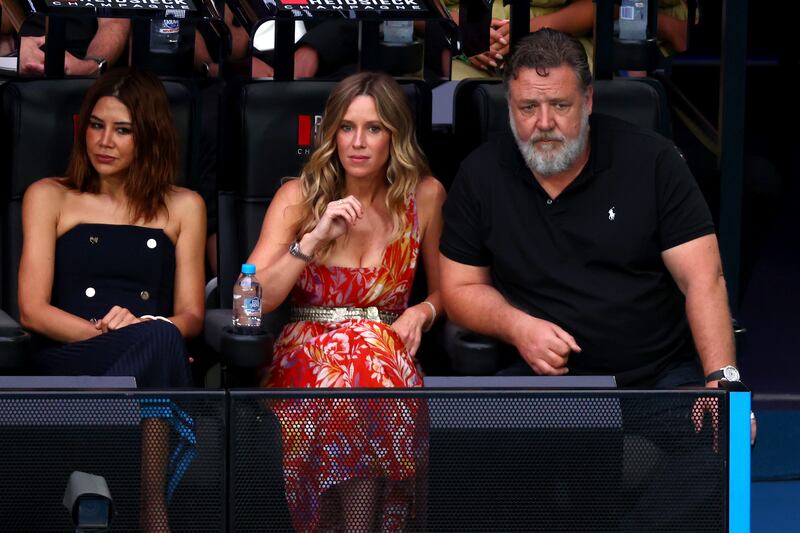 Actor Russell Crowe and Britney Theriot at the Australian Open women's final in Melbourne on Saturday. Getty